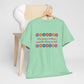 Isaiah 40:8 - Multi Daisy Cotton T-Shirt
